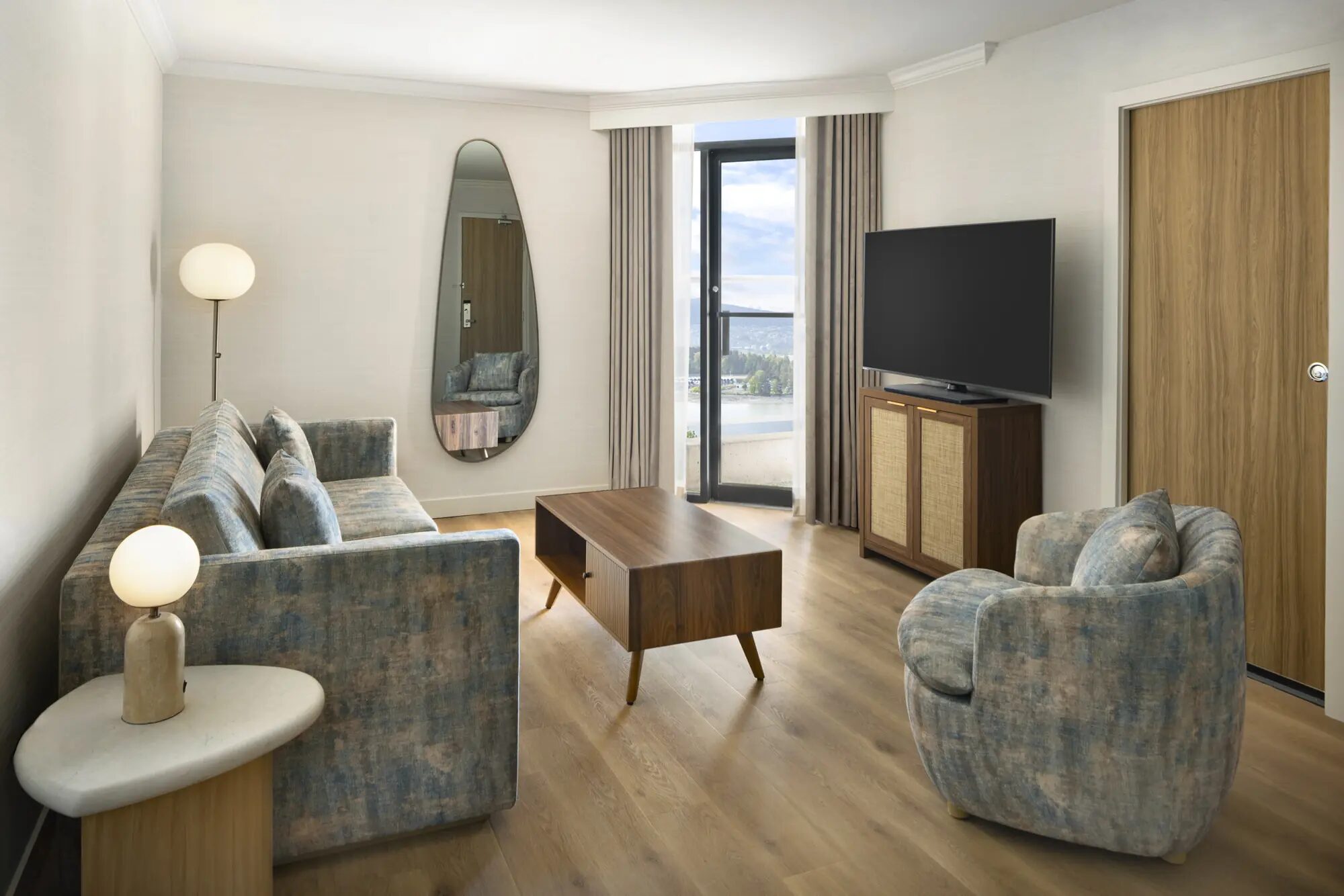 One Bedroom Suite living space at Pinnacle Hotel Harbourfront